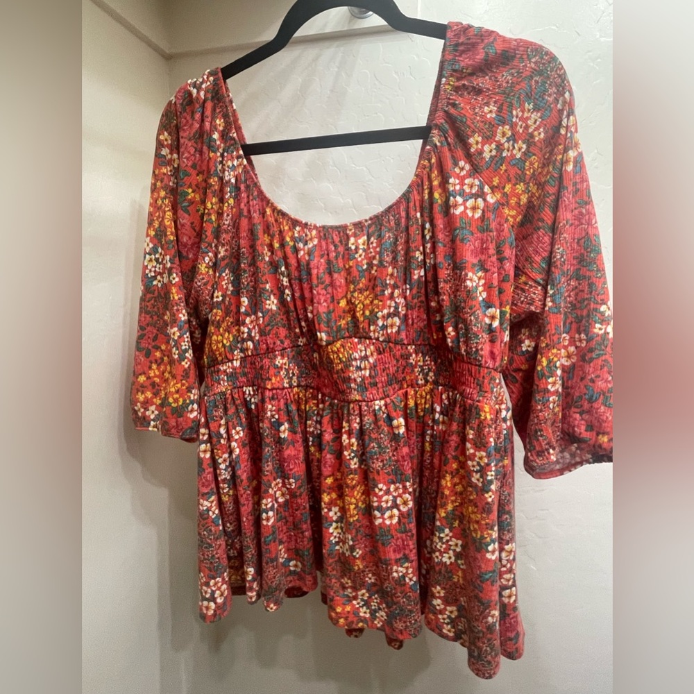 Torrid floral peplum top